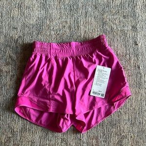 Lululemon high-rise hotty hot shorts, size 6 in sonic pink 4” inseam. EUC